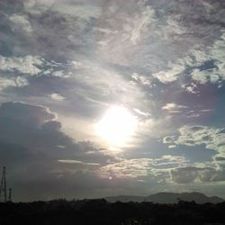 Scenic view of landscape against cloudy sky