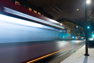 Blurred motion of train at railroad station platform