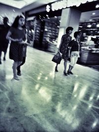 Blurred motion of people at subway station