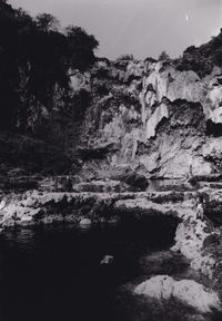 Rock formations along trees