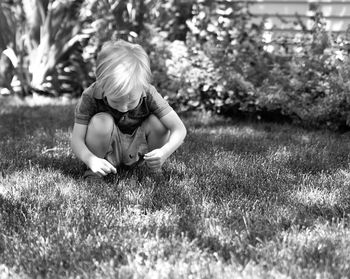 Man relaxing on grassy field