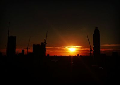 Silhouette of buildings at sunset