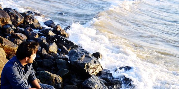 High angle view of man surfing in sea