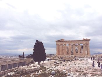 Old ruin building against cloudy sky