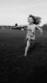 Woman standing on field