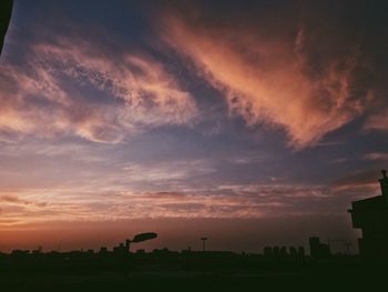 Scenic view of silhouette landscape against sky during sunset