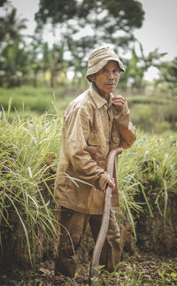 Portrait of farmer working in farm