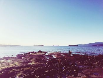 Scenic view of sea against clear sky