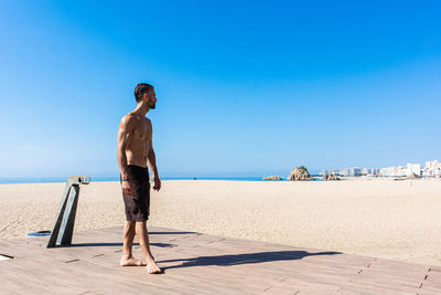 Sportsman practicing stretching and calisthenics