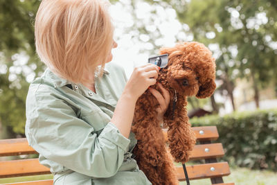 Woman with dog outdoors