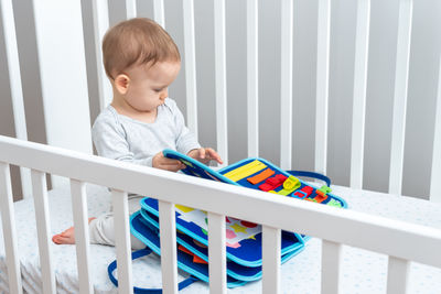 Boy playing with toy blocks