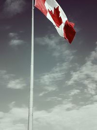 Low angle view of flag against sky