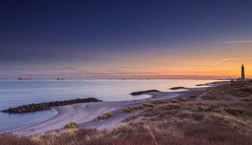 Scenic view of sea against sky during sunset