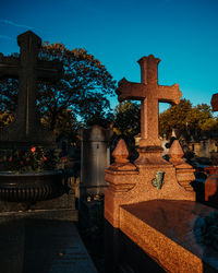 View of cemetery against blue sky