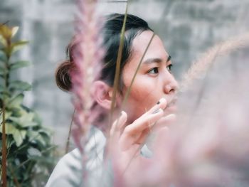 Portrait of woman looking away