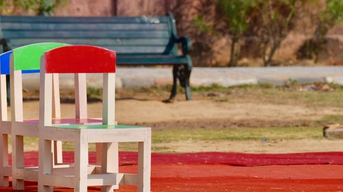 Colourful chairs on the ground