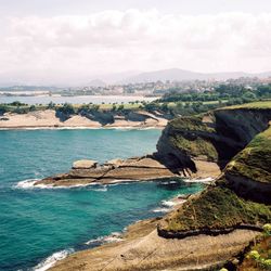 Scenic view of cantabrian sea against cloudy sky