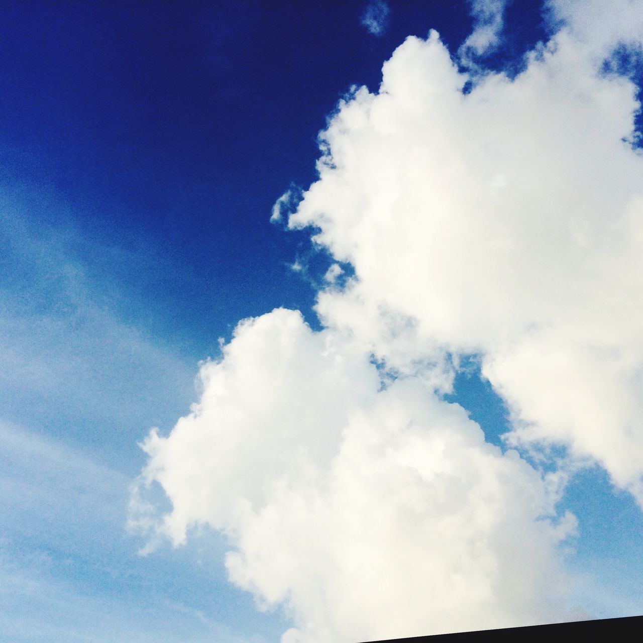 low angle view, blue, sky, cloud - sky, beauty in nature, sky only, nature, tranquility, cloud, scenics, cloudscape, cloudy, white color, tranquil scene, backgrounds, day, outdoors, no people, idyllic, white