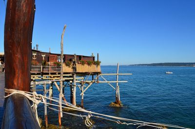View of sea against clear blue sky