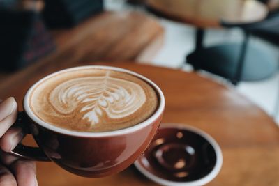 Close-up of coffee cup on table