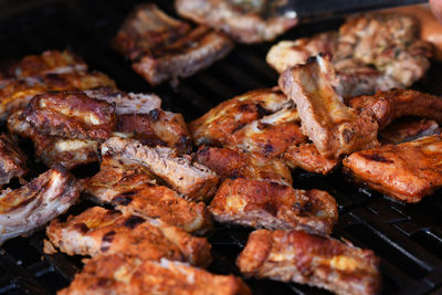 Close-up of meat on barbecue grill