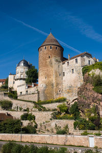 Low angle view of fort against sky