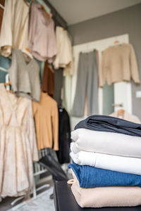 Close-up of clothes hanging in store