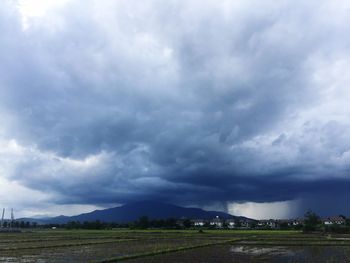 Storm clouds over land