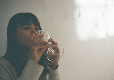 Portrait of man drinking glass