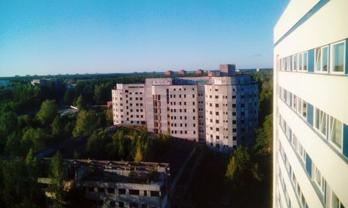 Buildings against clear sky