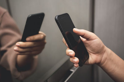 Close-up of person using mobile phone