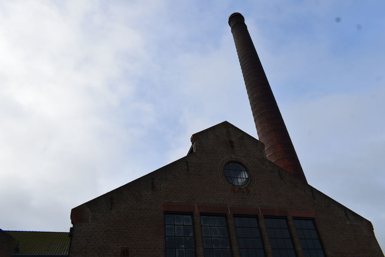 LOW ANGLE VIEW OF SMOKE AGAINST SKY