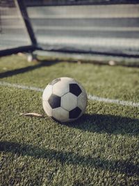 Close-up of ball on soccer field