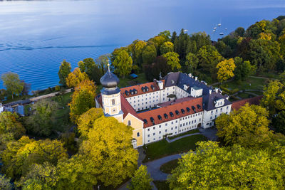 High angle view of trees and buildings against sky