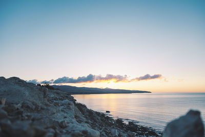 Scenic view of sea against sky during sunset