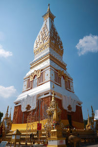 Low angle view of statue of building against sky