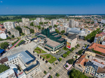 High angle view of buildings in city against sky