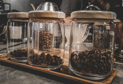 Close-up of coffee beans in glass jar