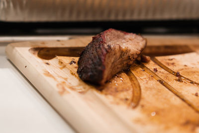 Close-up of meat on cutting board