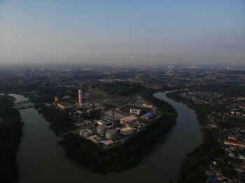 High angle view of river amidst buildings in city