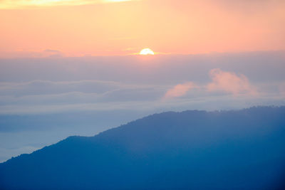 Scenic view of mountains against sky during sunset