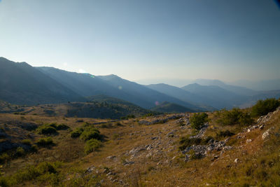 Scenic view of mountain range against clear sky