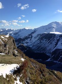 Scenic view of mountains against sky during winter