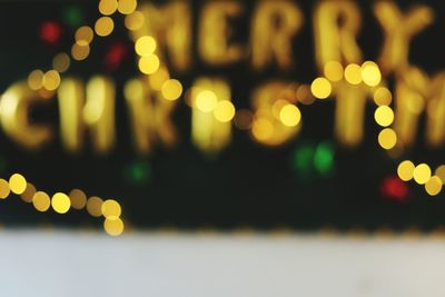 Defocused image of illuminated christmas tree