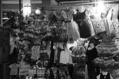 Clothes hanging for sale at market stall