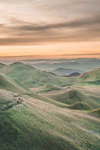 Scenic view of landscape against sky during sunset