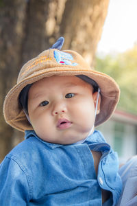 Portrait of cute boy wearing hat