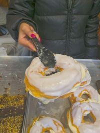 Close-up of hand holding ice cream