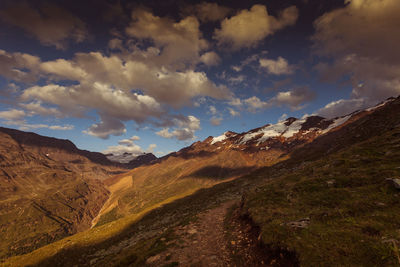 Sunset panorama of alpine highlands countryside with glaciers, alto adige, italy