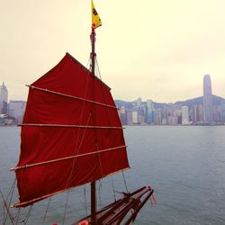 Panoramic view of sea and buildings against sky